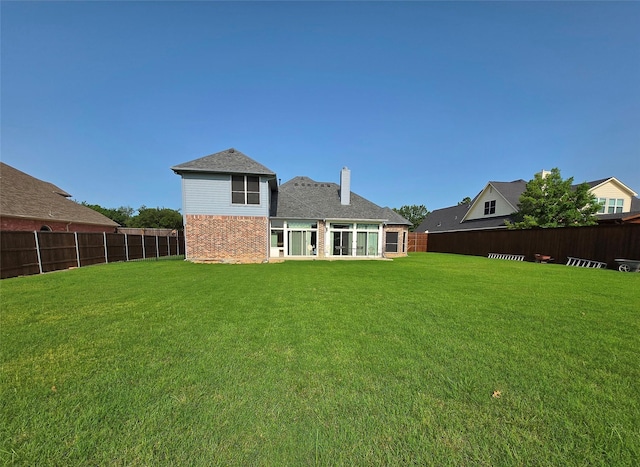 104 Olives Br, Shady Shores, TX 76208 - rear view of property featuring a fenced backyard and brick siding