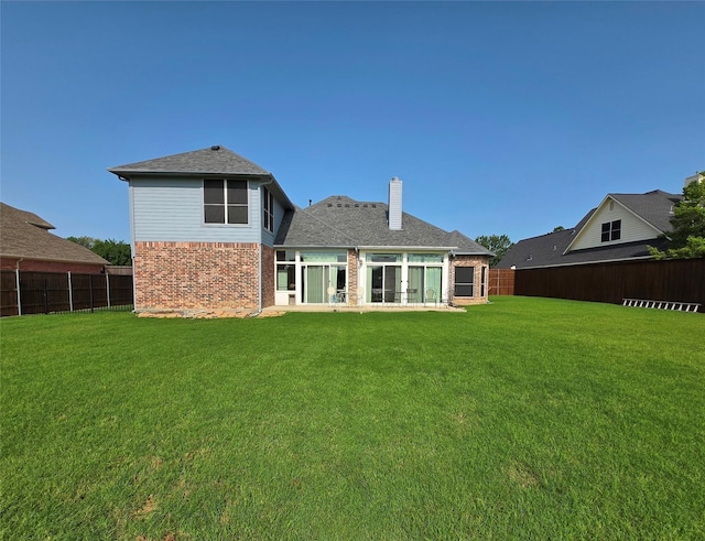 104 Olives Br, Shady Shores, TX 76208 - rear view of property with brick siding, a fenced backyard, and a chimney
