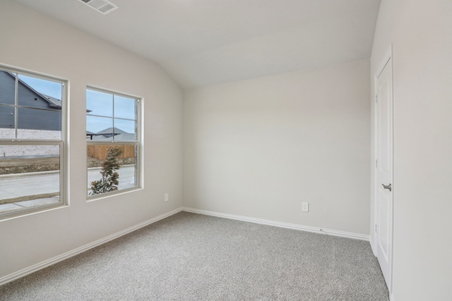 968 Linden Ct, Lavon, TX 75166 - spare room with carpet, vaulted ceiling, and baseboards