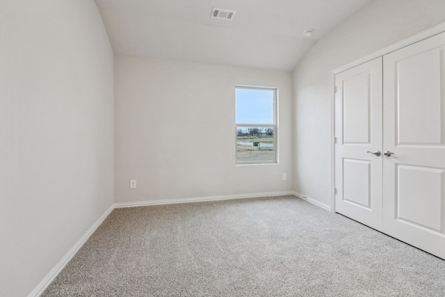 968 Linden Ct, Lavon, TX 75166 - unfurnished bedroom with carpet flooring, lofted ceiling, baseboards, and a closet