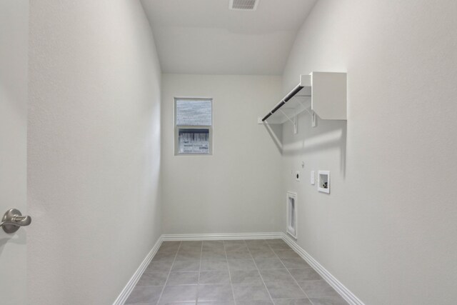 968 Linden Ct, Lavon, TX 75166 - washroom featuring hookup for a gas dryer, hookup for an electric dryer, hookup for a washing machine, baseboards, and light tile patterned floors