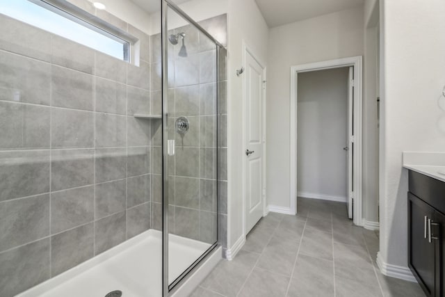 968 Linden Ct, Lavon, TX 75166 - bathroom with a shower stall, vanity, tile patterned flooring, and baseboards