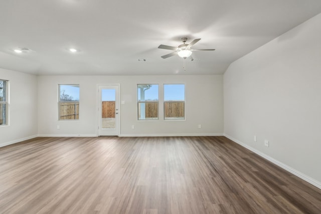 968 Linden Ct, Lavon, TX 75166 - unfurnished living room featuring healthy amount of natural light, wood finished floors, baseboards, a ceiling fan, and recessed lighting