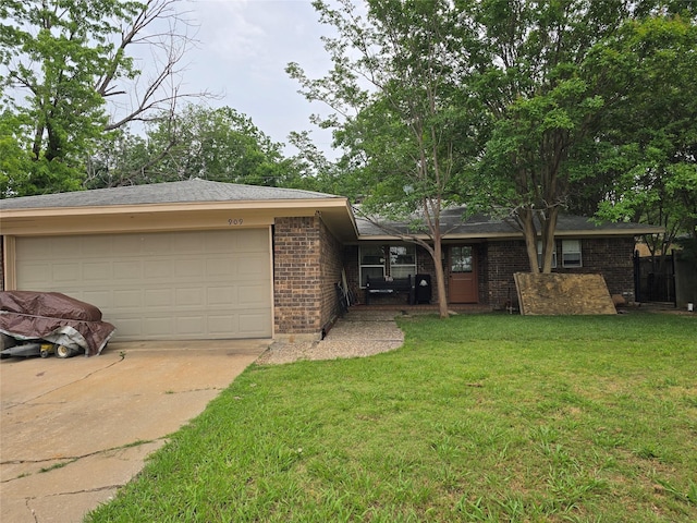 909 Mckinney Ave, Princeton, TX 75407 - ranch-style home with concrete driveway, brick siding, an attached garage, and a front lawn