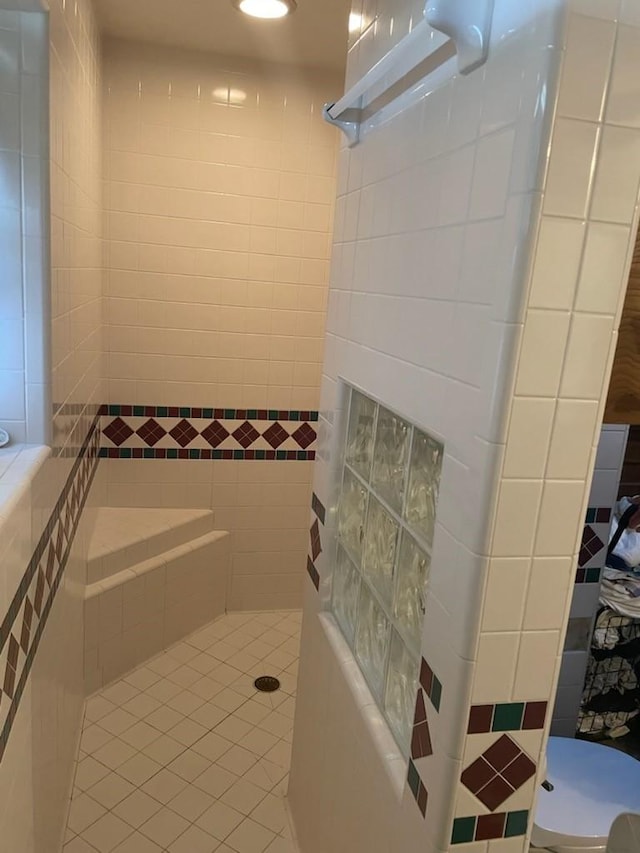 909 Mckinney Ave, Princeton, TX 75407 - bathroom featuring a walk in shower and tile patterned floors