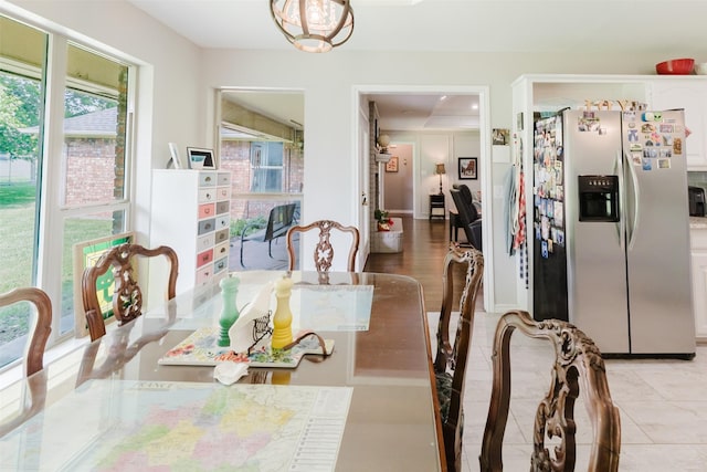 305 Brookview Dr, Decatur, TX 76234 - dining space with light tile patterned floors and baseboards