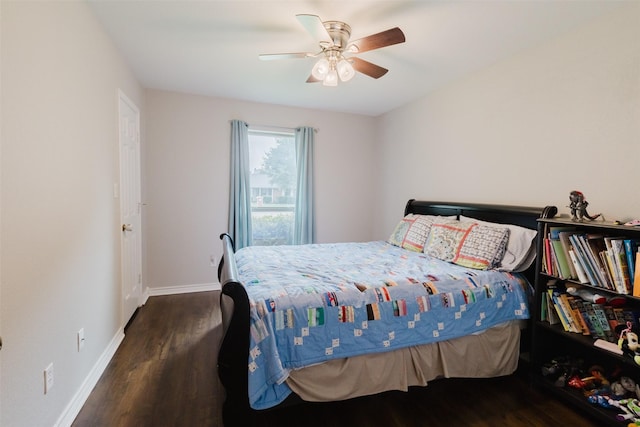 305 Brookview Dr, Decatur, TX 76234 - bedroom with wood finished floors, baseboards, and a ceiling fan