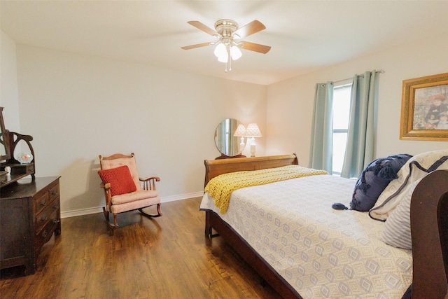 305 Brookview Dr, Decatur, TX 76234 - bedroom featuring dark wood finished floors, a ceiling fan, and baseboards