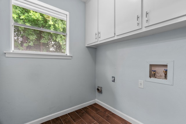 5225 Fallworth Ct, Fort Worth, TX 76133 - laundry area featuring electric dryer hookup, cabinet space, baseboards, dark wood-type flooring, and washer hookup