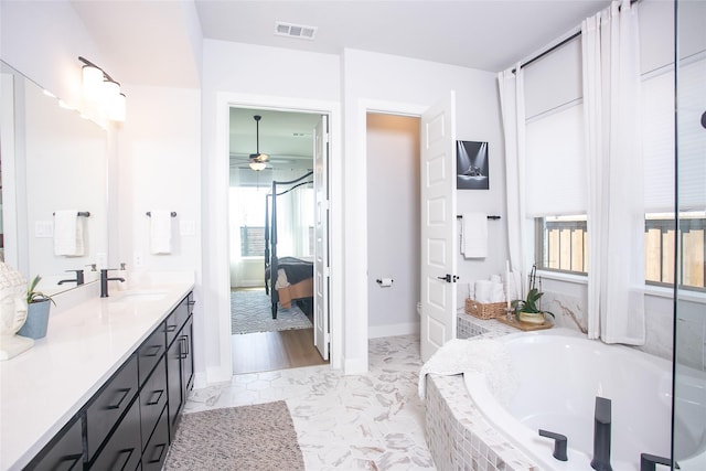 2708 Darlington Rd, Northlake, TX 76226 - full bathroom featuring ensuite bathroom, double vanity, ceiling fan, and a bath