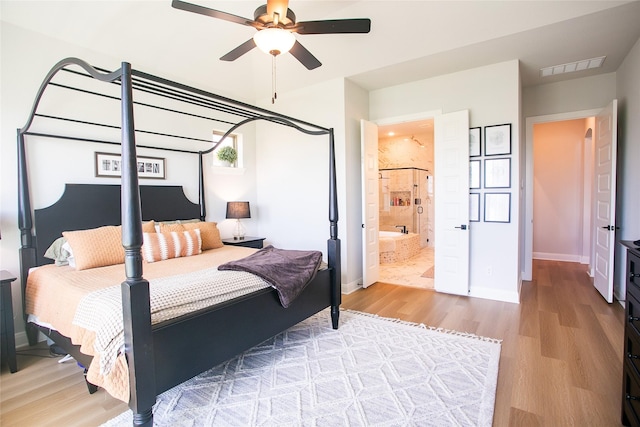 2708 Darlington Rd, Northlake, TX 76226 - bedroom featuring wood finished floors, ensuite bathroom, and ceiling fan