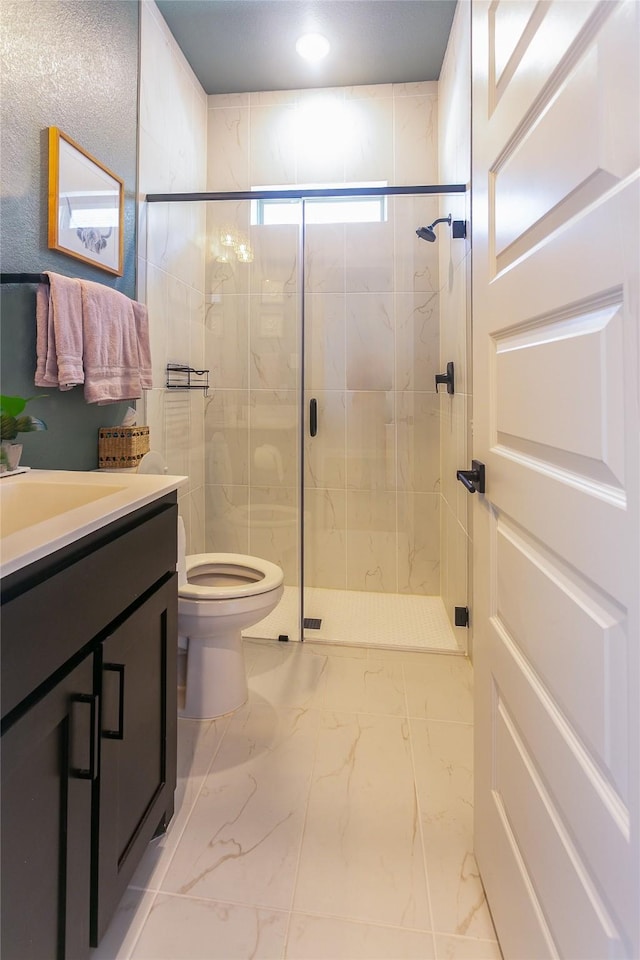 2708 Darlington Rd, Northlake, TX 76226 - bathroom featuring vanity, a shower stall, toilet, and marble look tile flooring