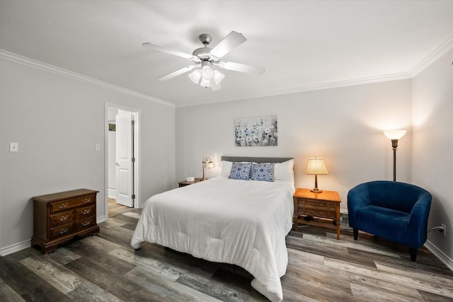 200 Oakview Cir, Mexia, TX 76667 - bedroom with ornamental molding, wood finished floors, baseboards, and ceiling fan