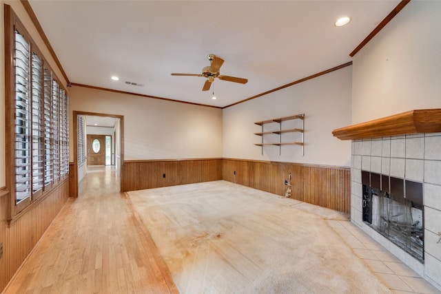11103 Manorview Cir, Dallas, TX 75228 - unfurnished living room with a wainscoted wall, crown molding, a fireplace, recessed lighting, and ceiling fan
