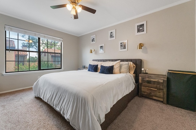 4800 Northway Dr Unit 17A, Dallas, TX 75206 - carpeted bedroom with crown molding, baseboards, and ceiling fan