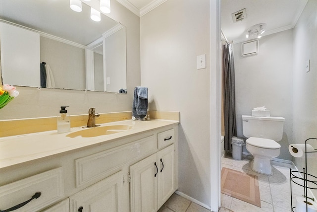 4800 Northway Dr Unit 17A, Dallas, TX 75206 - bathroom with ornamental molding, toilet, vanity, baseboards, and tile patterned floors