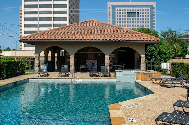 4800 Northway Dr Unit 17A, Dallas, TX 75206 - view of swimming pool featuring a patio, a gazebo, and a pool with connected hot tub