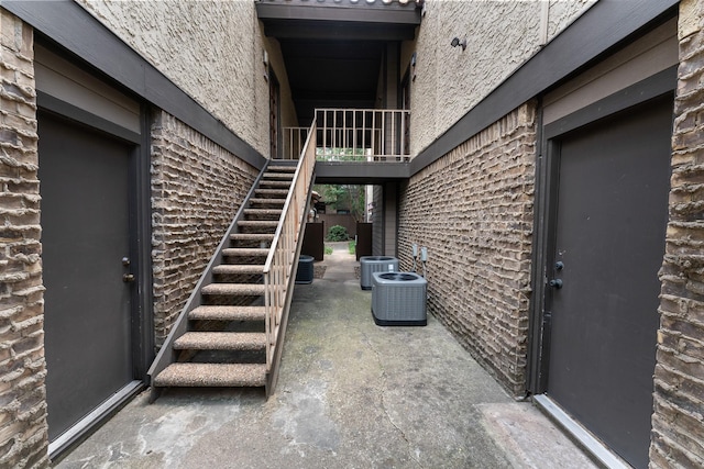 4800 Northway Dr Unit 17A, Dallas, TX 75206 - view of patio featuring stairs and central air condition unit