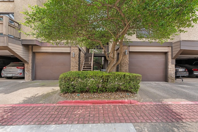 4800 Northway Dr Unit 17A, Dallas, TX 75206 - view of front of home with stairs and stucco siding