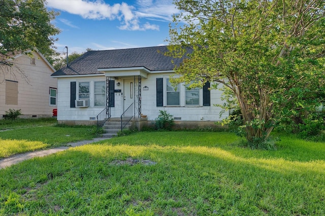 4216 Beverly Dr, Waco, TX 76711 - view of front of home with crawl space, a shingled roof, a front yard, and cooling unit