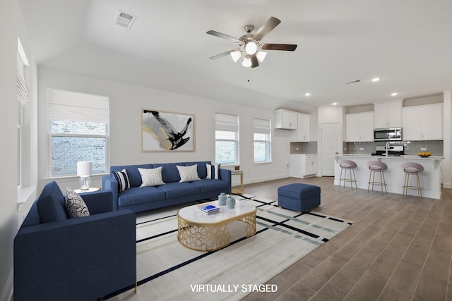 612 Amenduni Ln, Anna, TX 75409 - living area with a ceiling fan, recessed lighting, light wood finished floors, and baseboards