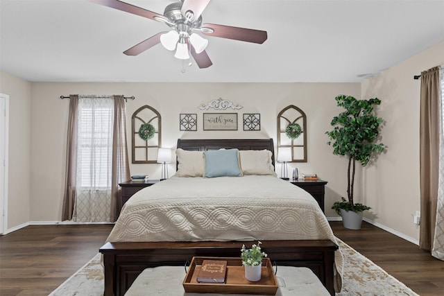 8537 Gray Shale Dr, Fort Worth, TX 76179 - bedroom featuring dark wood finished floors, baseboards, and a ceiling fan