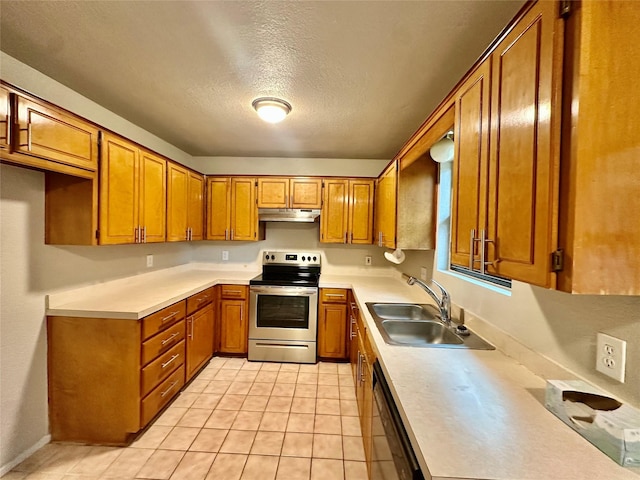 677 County Road 3081, Lampasas, TX 76550 - kitchen with stainless steel electric range oven, a sink, brown cabinets, black dishwasher, and a textured ceiling