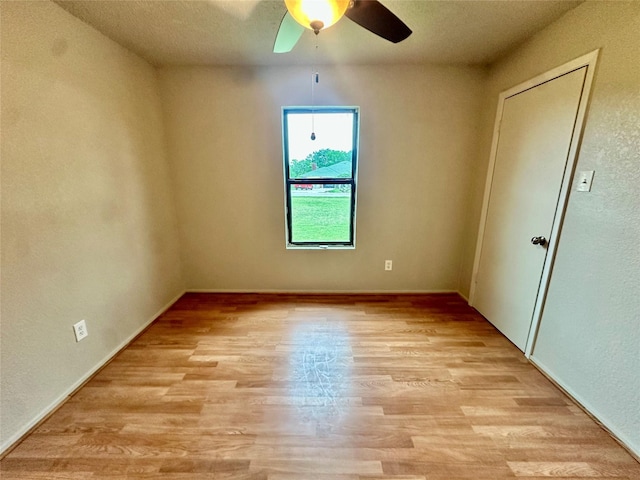 677 County Road 3081, Lampasas, TX 76550 - spare room with a ceiling fan, light wood-type flooring, and baseboards