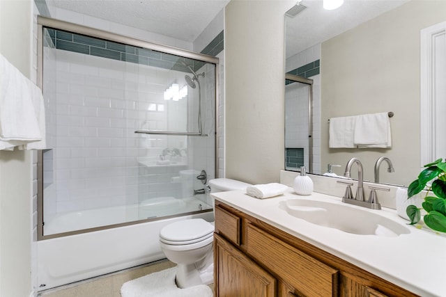 905 Wildwood Cir, Grapevine, TX 76051 - bathroom featuring toilet, shower / bath combination with glass door, and vanity