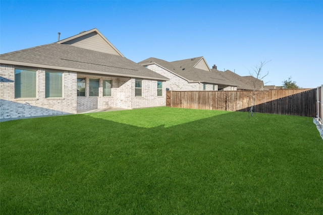 5836 Priory Dr, Celina, TX 76227 - back of house with roof with shingles and brick siding