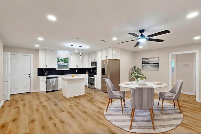 3103 Andrea Ln, Dallas, TX 75228 - dining area with recessed lighting, light wood-type flooring, and a ceiling fan