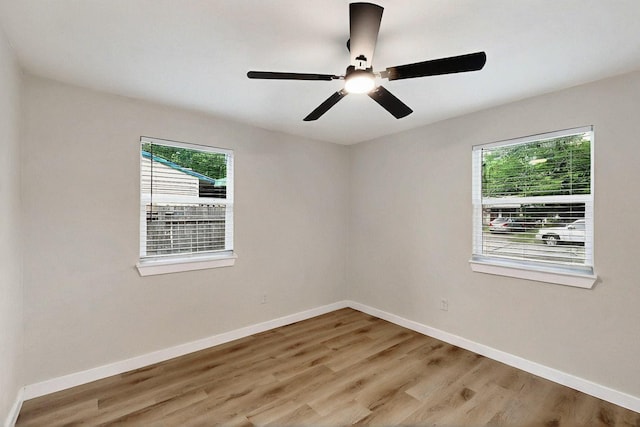 3103 Andrea Ln, Dallas, TX 75228 - spare room with light wood finished floors and a ceiling fan