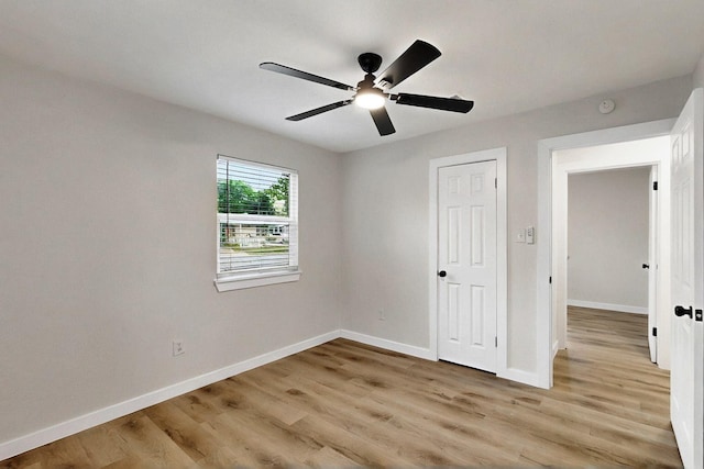 3103 Andrea Ln, Dallas, TX 75228 - unfurnished bedroom with light wood-style flooring and a ceiling fan