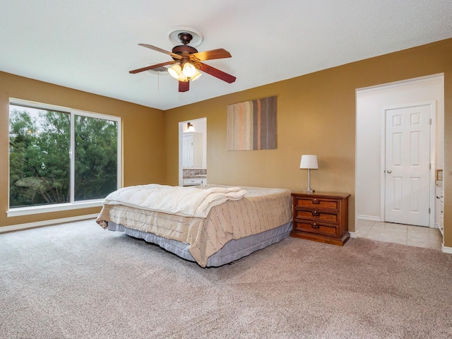 905 High Rd, Coleman, TX 76834 - bedroom featuring light carpet, baseboards, and ceiling fan