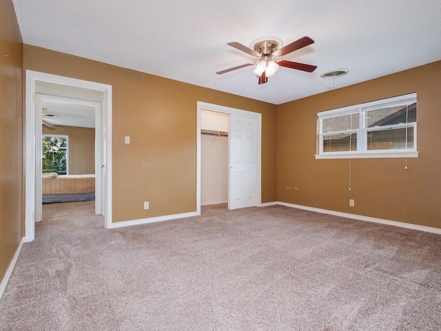 905 High Rd, Coleman, TX 76834 - unfurnished bedroom featuring carpet floors, baseboards, and a closet