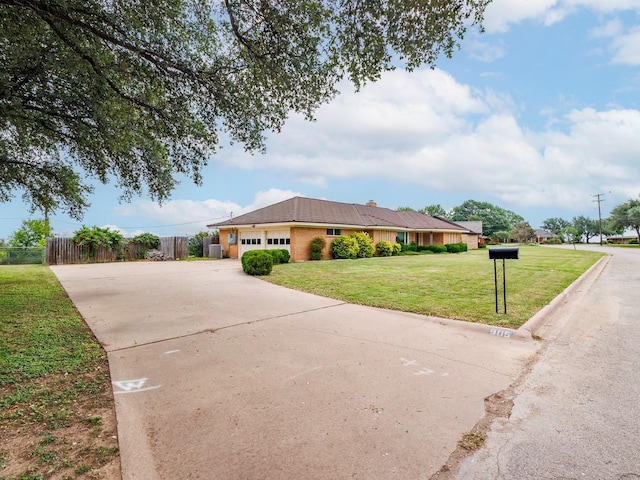 905 High Rd, Coleman, TX 76834 - ranch-style house with a garage and concrete driveway