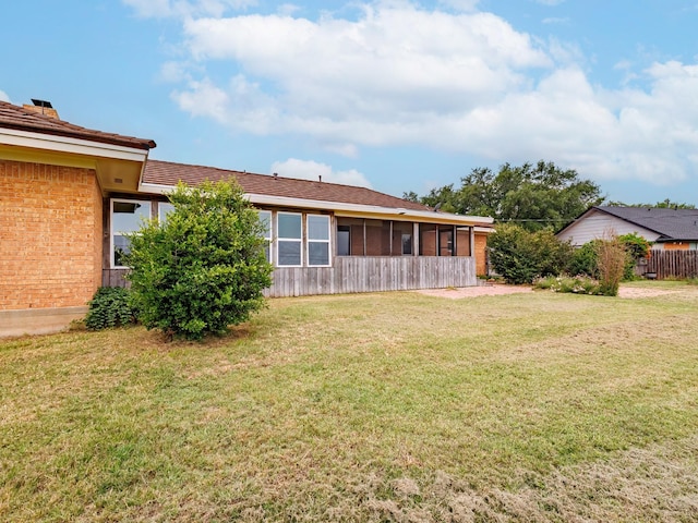 905 High Rd, Coleman, TX 76834 - view of green lawn featuring a sunroom