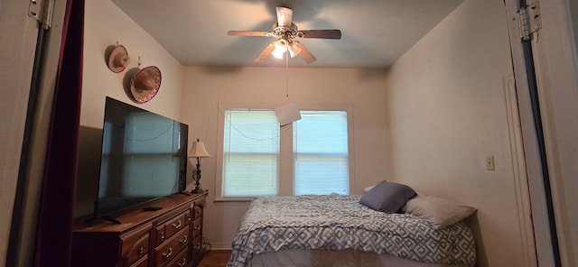 2821 Delaware Trl, Lake Worth, TX 76135 - bedroom with a ceiling fan and dark wood-type flooring