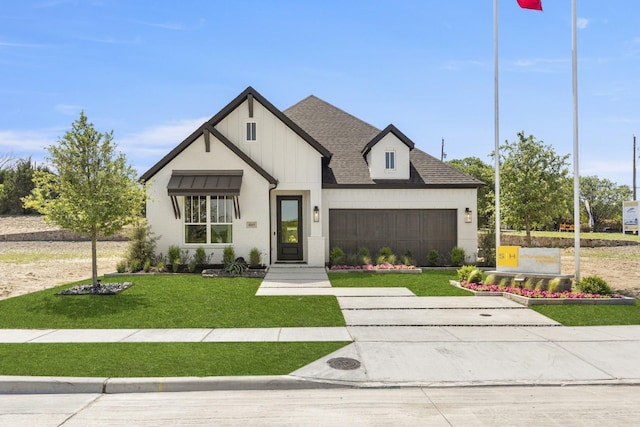1015 Olympic Dr, Rockwall, TX 75087 - modern farmhouse with a garage, a front lawn, concrete driveway, board and batten siding, and roof with shingles