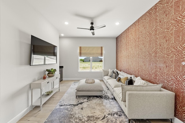 1015 Olympic Dr, Rockwall, TX 75087 - living room with baseboards, ceiling fan, light wood finished floors, recessed lighting, and an accent wall