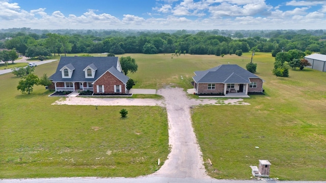21 Graham Ln, Lucas, TX 75002 - view of subject property with a tree filled landscape