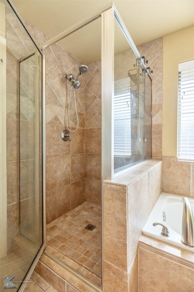 210 Miss Ellie Ln, Abilene, TX 79602 - full bath featuring a shower stall, a garden tub, and tile patterned flooring