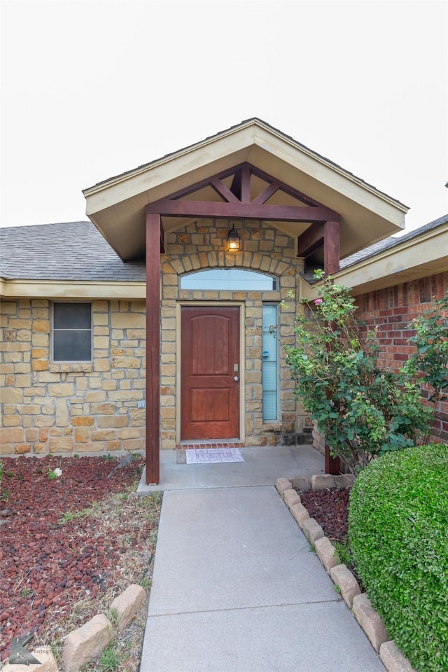 210 Miss Ellie Ln, Abilene, TX 79602 - entrance to property with stone siding and a shingled roof