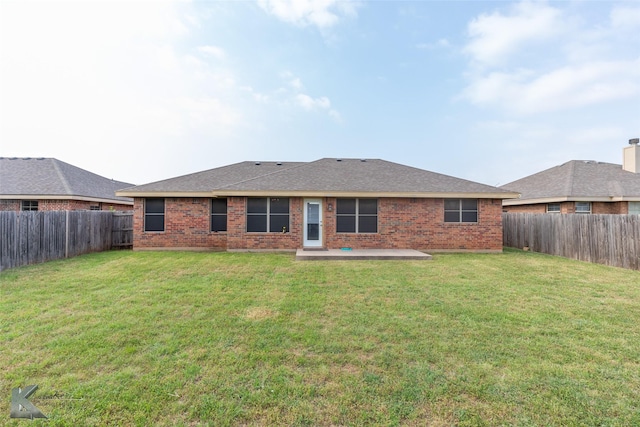 210 Miss Ellie Ln, Abilene, TX 79602 - rear view of property with brick siding, a patio, and a shingled roof