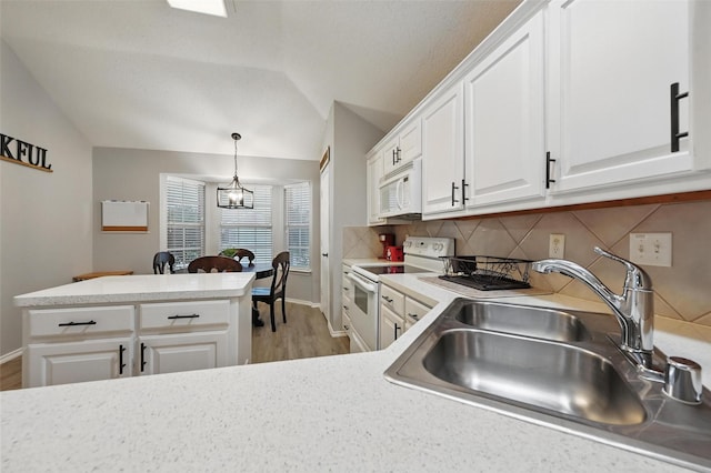 4525 Wheatland Dr, Fort Worth, TX 76179 - kitchen featuring white appliances, a sink, backsplash, light wood-style flooring, and light countertops