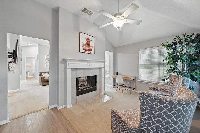 4525 Wheatland Dr, Fort Worth, TX 76179 - living room featuring carpet floors, vaulted ceiling, a ceiling fan, a fireplace, and baseboards