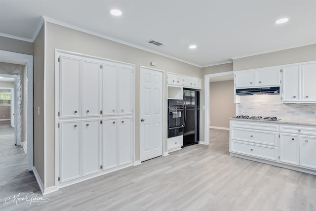 156 Charles Ave, Shreveport, LA 71105 - kitchen with baseboards, white cabinetry, a warming drawer, black appliances, and ornamental molding