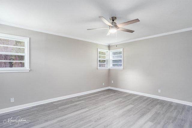 156 Charles Ave, Shreveport, LA 71105 - spare room with light wood-style floors, a ceiling fan, crown molding, and baseboards