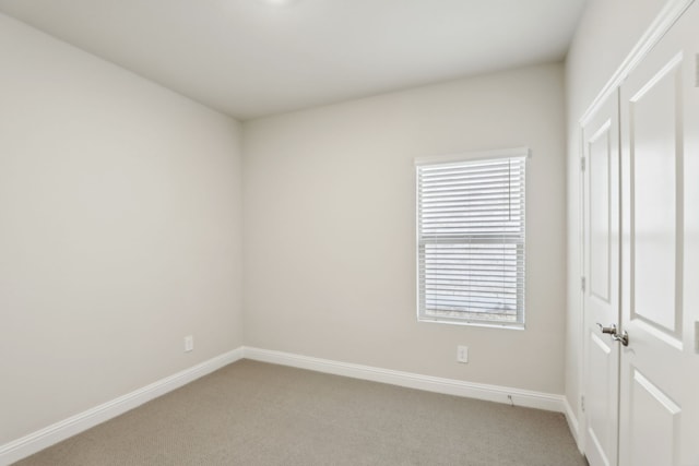 519 Willet Dr, Mckinney, TX 75069 - unfurnished bedroom with light carpet, baseboards, and multiple windows