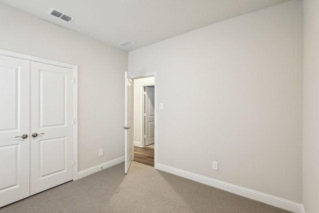 519 Willet Dr, Mckinney, TX 75069 - unfurnished bedroom featuring light carpet, baseboards, and a closet
